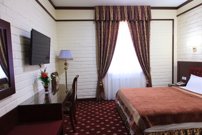 Imagen de la habitación del Hotel Rakat Plaza. Foto 12