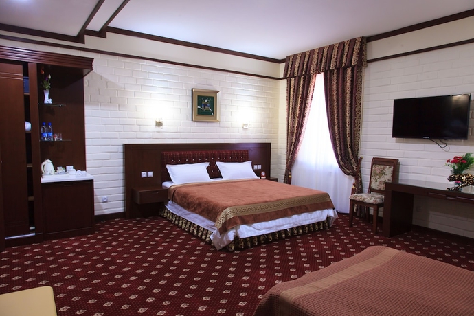 Imagen de la habitación del Hotel Rakat Plaza. Foto 14