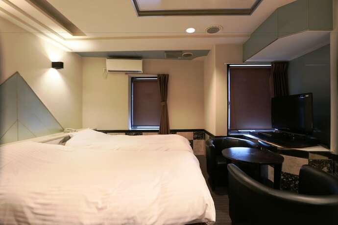 Imagen de la habitación del Hotel Raku Serina. Foto 7