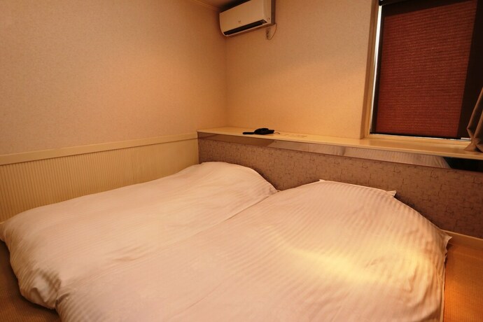 Imagen de la habitación del Hotel Raku Serina. Foto 9
