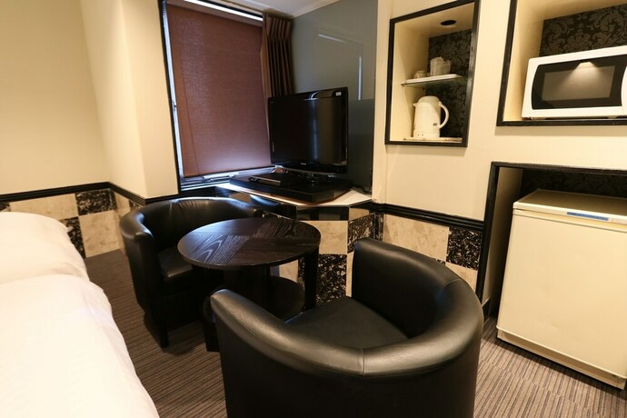 Imagen de la habitación del Hotel Raku Serina. Foto 12
