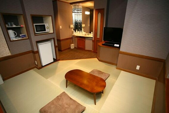 Imagen de la habitación del Hotel Raku Serina. Foto 13