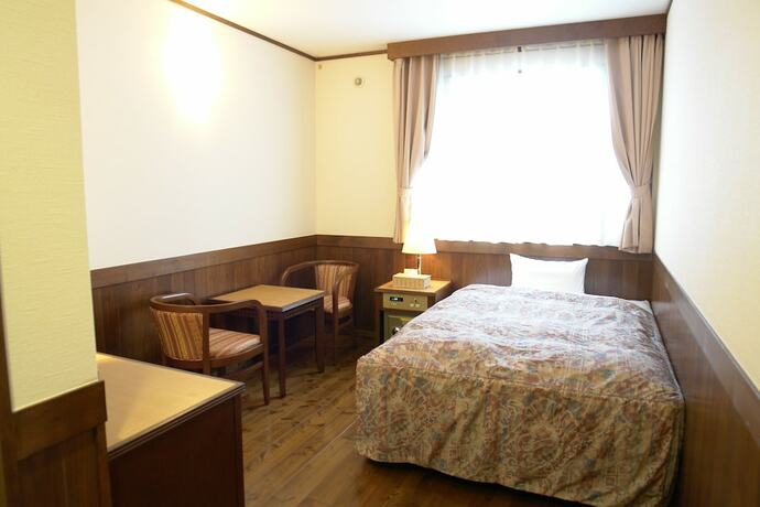 Imagen de la habitación del Hotel Rakuchin. Foto 12