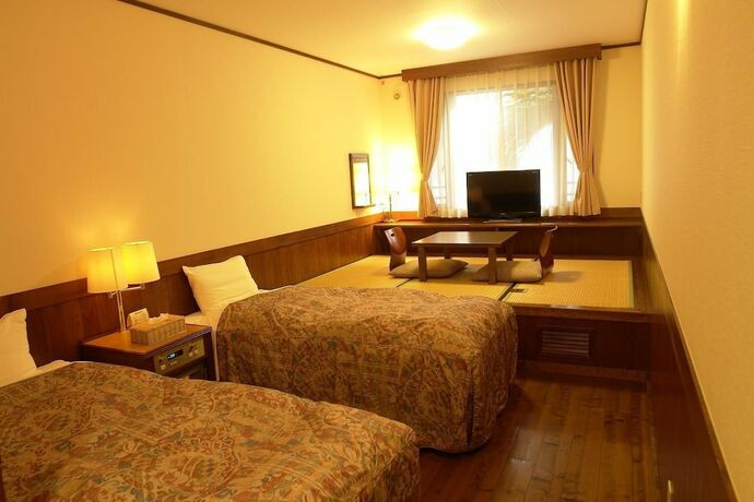 Imagen de la habitación del Hotel Rakuchin. Foto 17