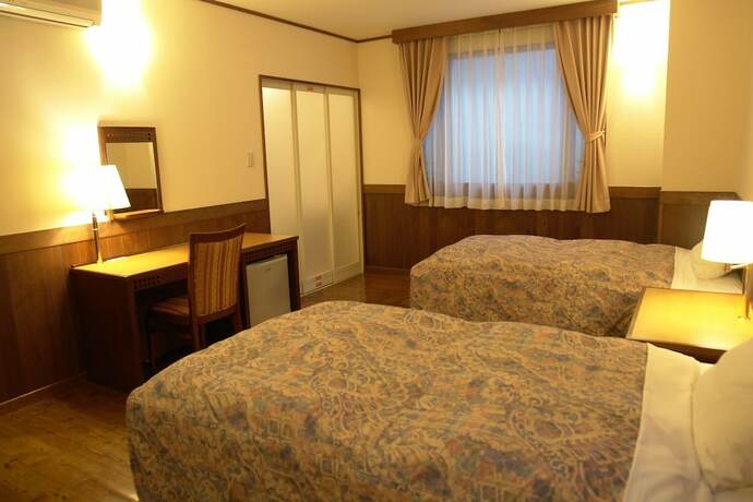 Imagen de la habitación del Hotel Rakuchin. Foto 18