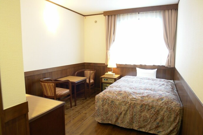 Imagen de la habitación del Hotel Rakuchin. Foto 20
