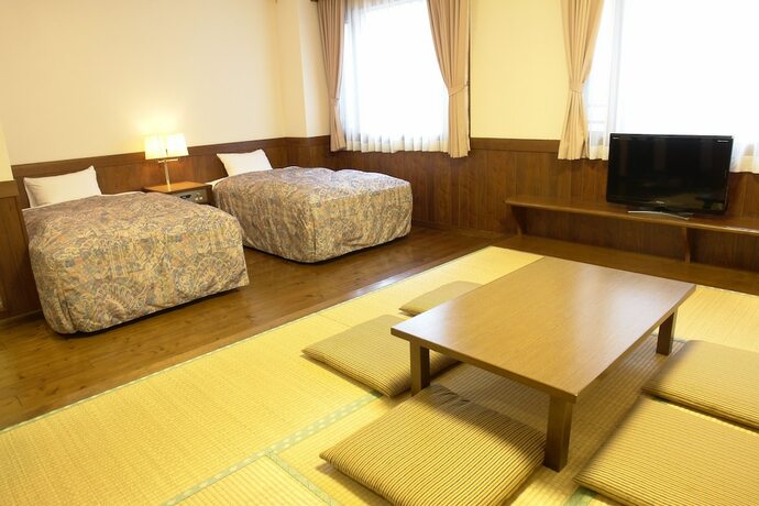 Imagen de la habitación del Hotel Rakuchin. Foto 23