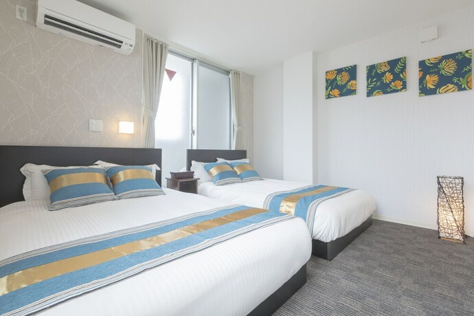 Imagen de la habitación del Hotel Rakuraku Inn Miyabi. Foto 17