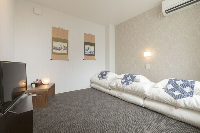 Imagen de la habitación del Hotel Rakuraku Inn Miyabi. Foto 23