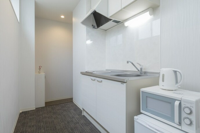Imagen de la habitación del Hotel Rakuraku Inn Miyabi. Foto 27