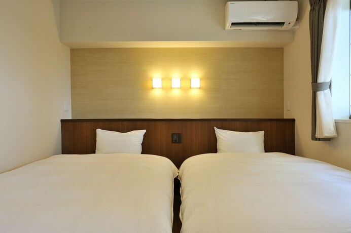 Imagen de la habitación del Hotel RakutenSTAY&times;Shamaison Osaka Dekijima Station. Foto 12