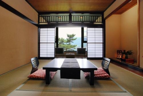 Imagen de la habitación del Hotel Rakuyu. Foto 6