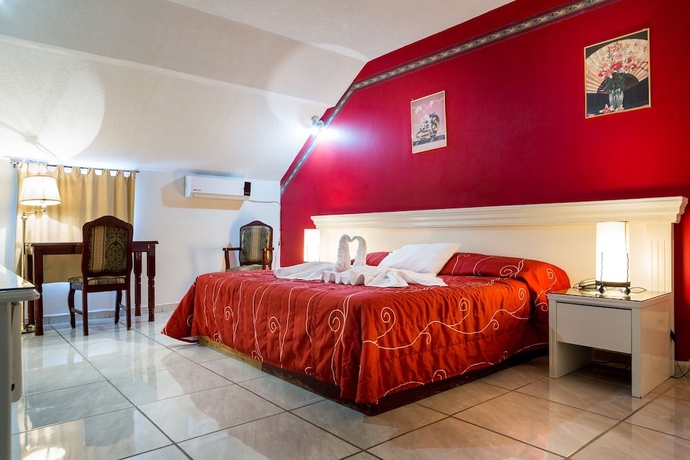 Imagen de la habitación del Hotel Raldos Inn. Foto 8