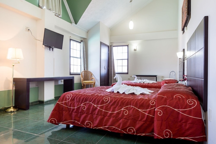 Imagen de la habitación del Hotel Raldos Inn. Foto 10