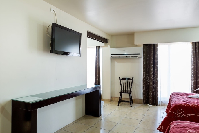Imagen de la habitación del Hotel Raldos Inn. Foto 12