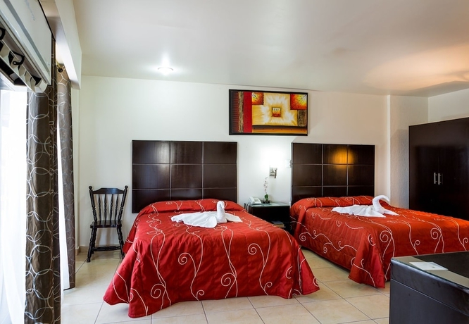 Imagen de la habitación del Hotel Raldos Inn. Foto 13
