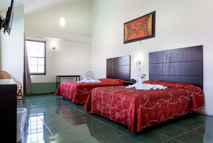 Imagen de la habitación del Hotel Raldos Inn. Foto 15