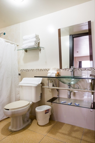 Imagen de la habitación del Hotel Raldos Inn. Foto 16