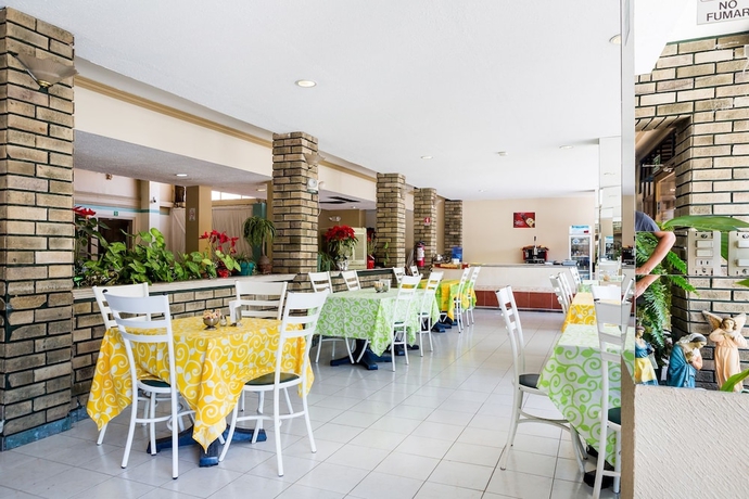 Imagen del bar/restaurante del Hotel Raldos Inn. Foto 6