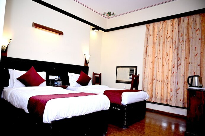 Imagen de la habitación del Hotel Ram Vilas By Fork Plaza. Foto 17