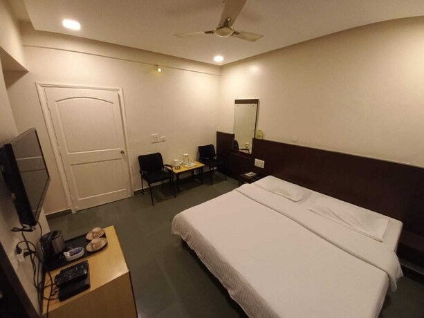 Imagen de la habitación del Hotel Rama Heritage. Foto 27