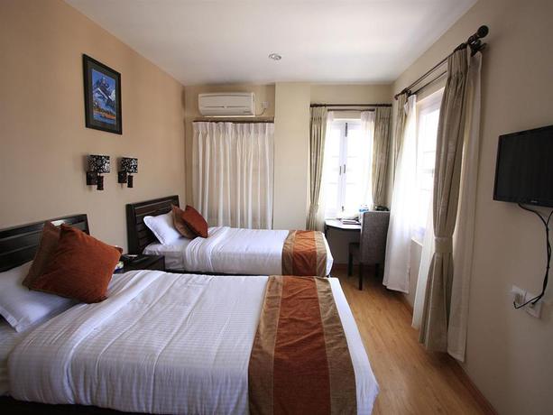 Imagen de la habitación del Hotel Rama Inn Boutique Home. Foto 4