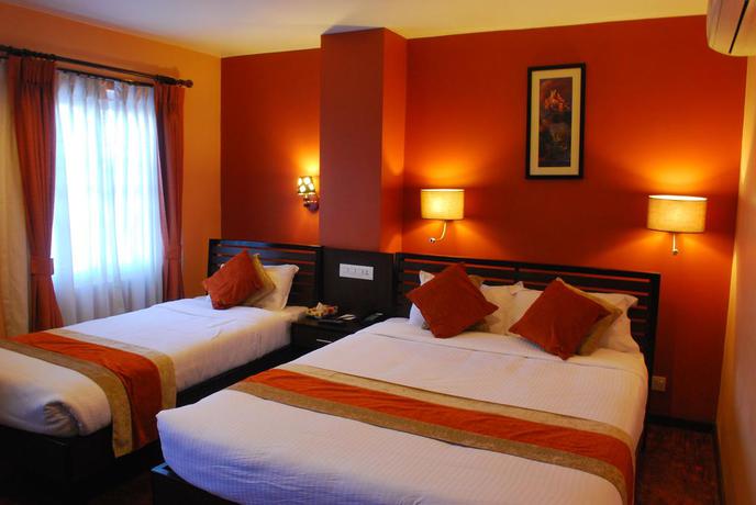 Imagen de la habitación del Hotel Rama Inn Boutique Home. Foto 6