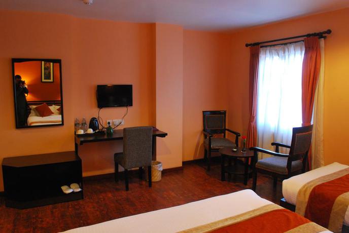 Imagen de la habitación del Hotel Rama Inn Boutique Home. Foto 8