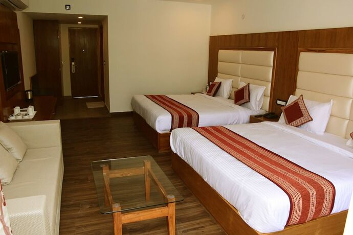 Imagen de la habitación del Hotel Rama Trident. Foto 12
