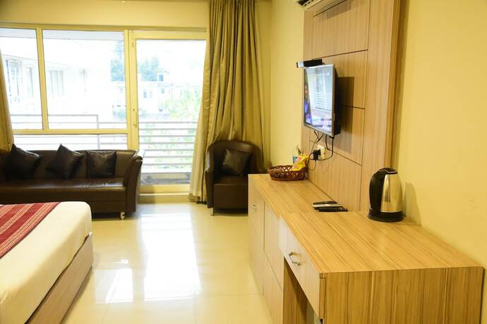 Imagen de la habitación del Hotel Rama Trident. Foto 15