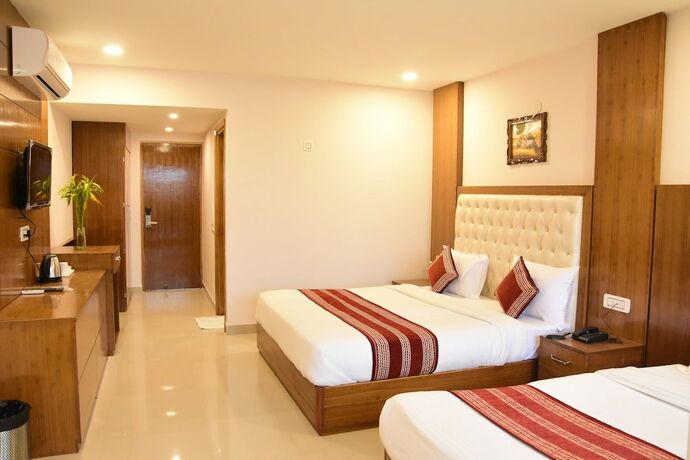Imagen de la habitación del Hotel Rama Trident. Foto 19