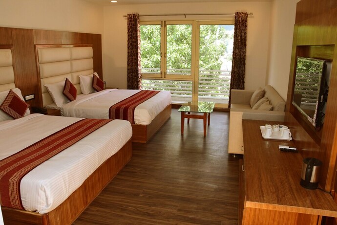 Imagen de la habitación del Hotel Rama Trident. Foto 21