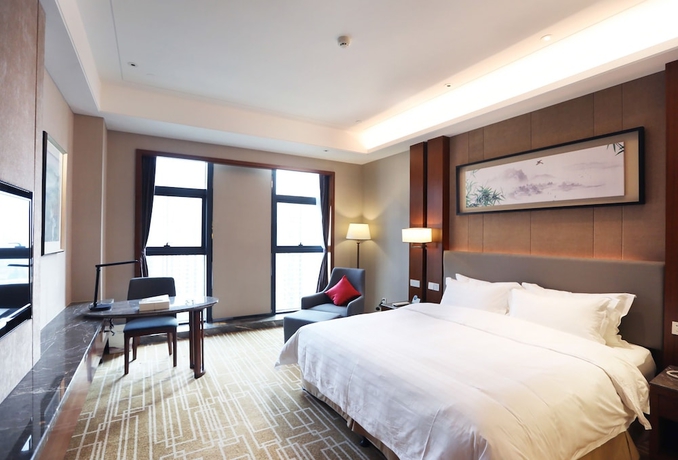 Imagen de la habitación del Hotel Ramada BY Wyndham Wuhan Hanyang. Foto 5