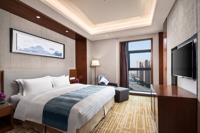 Imagen de la habitación del Hotel Ramada BY Wyndham Wuhan Hanyang. Foto 6