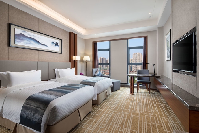 Imagen de la habitación del Hotel Ramada BY Wyndham Wuhan Hanyang. Foto 8