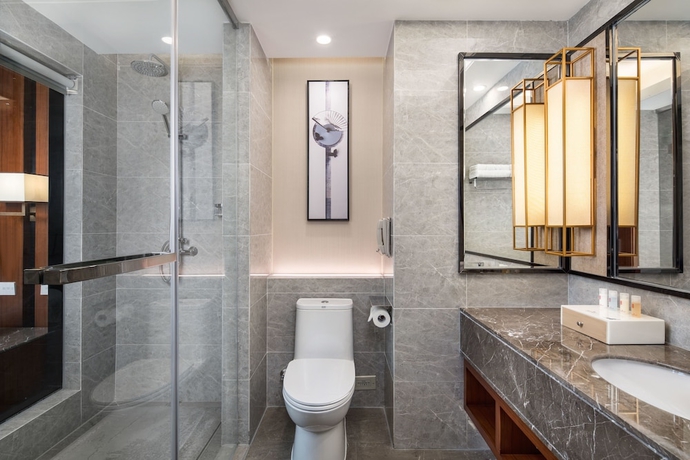 Imagen de la habitación del Hotel Ramada BY Wyndham Wuhan Hanyang. Foto 9