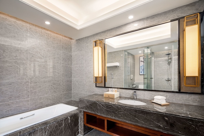 Imagen de la habitación del Hotel Ramada BY Wyndham Wuhan Hanyang. Foto 10