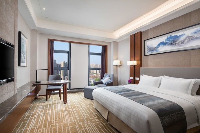 Imagen de la habitación del Hotel Ramada BY Wyndham Wuhan Hanyang. Foto 11