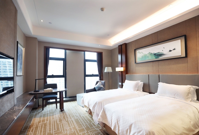 Imagen de la habitación del Hotel Ramada BY Wyndham Wuhan Hanyang. Foto 12