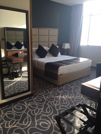 Imagen de la habitación del Hotel Ramada By Wyndham Abu Dhabi Corniche. Foto 11