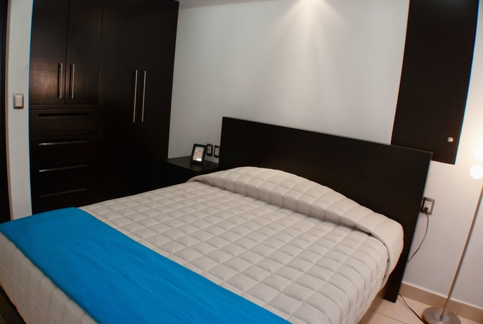 Imagen de la habitación del Hotel Ramada By Wyndham Acapulco and Suites. Foto 7