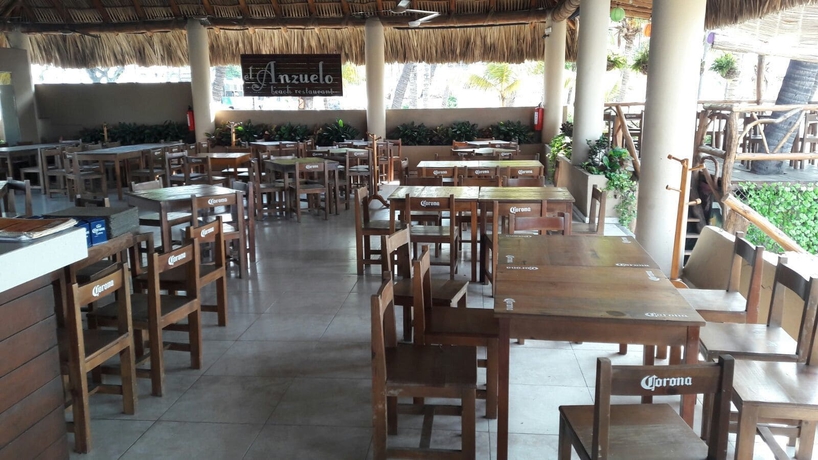 Imagen del bar/restaurante del Hotel Ramada By Wyndham Acapulco and Suites. Foto 3