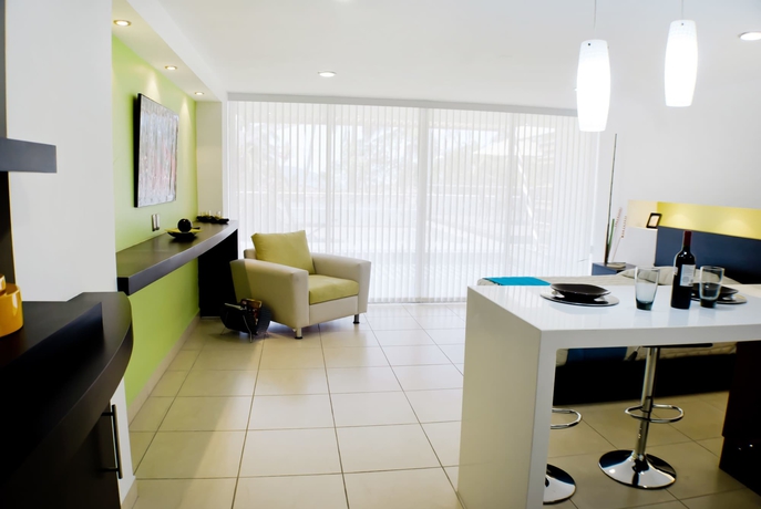 Imagen de la habitación del Hotel Ramada By Wyndham Acapulco and Suites. Foto 10