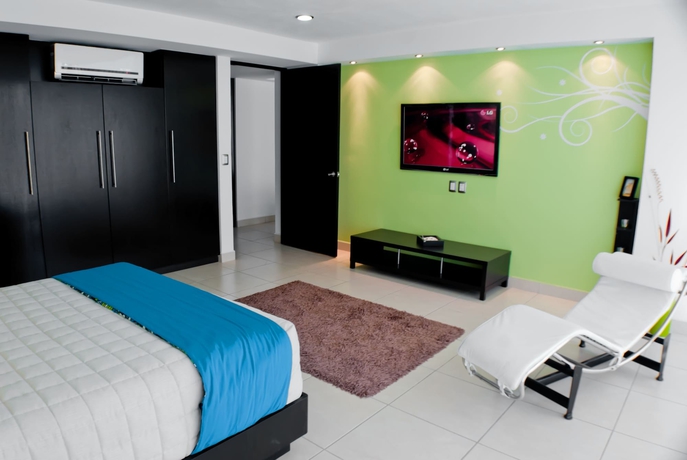 Imagen de la habitación del Hotel Ramada By Wyndham Acapulco and Suites. Foto 11