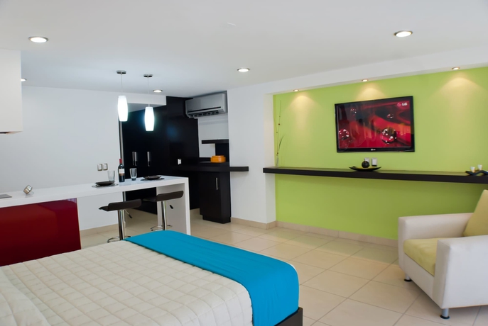 Imagen de la habitación del Hotel Ramada By Wyndham Acapulco and Suites. Foto 13