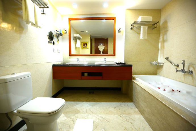 Imagen de la habitación del Hotel Ramada By Wyndham Amritsar. Foto 17