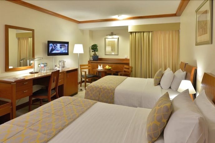 Imagen de la habitación del Hotel Ramada By Wyndham Bahrain. Foto 4