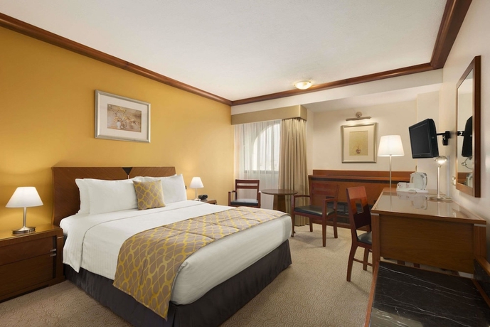 Imagen de la habitación del Hotel Ramada By Wyndham Bahrain. Foto 12