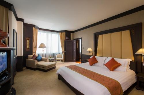 Imagen de la habitación del Hotel Ramada By Wyndham Bangkok Chaophya Park. Foto 9