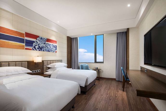 Imagen de la habitación del Hotel Ramada By Wyndham Baoji Jintai. Foto 6